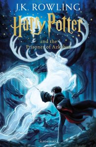 Book cover of 'Harry Potter and the Prisoner of Azkaban' by J.K. Rowling, featuring a magical scene with a Patronus in the shape of a stag.